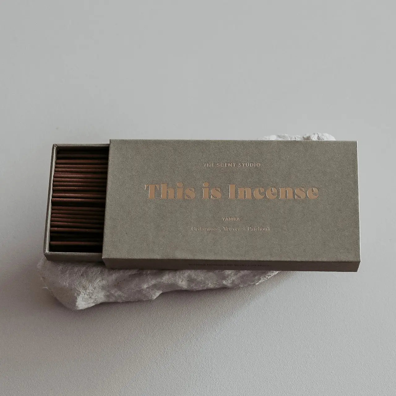 “Yamba incense packaging styled with neutral home decor for a minimal aesthetic”