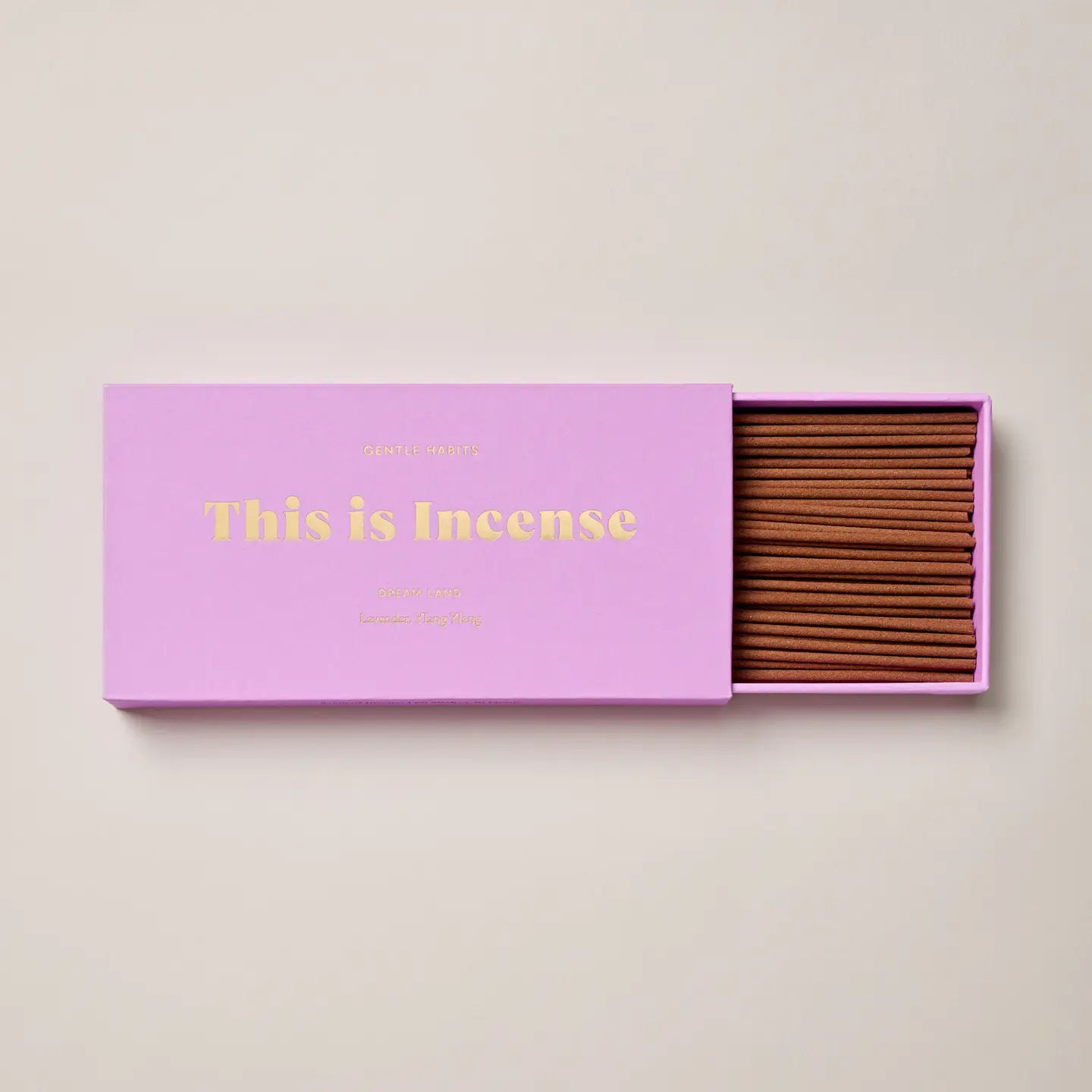 Dreamland incense packaging styled with soft lighting and floral mood