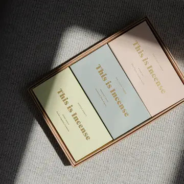 “Flatlay of Margaret River incense with ceramic cup and shadows”