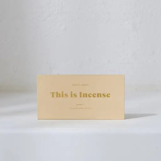 “Cream-toned ‘This Is Incense – Connect’ packaging on a minimalist backdrop”